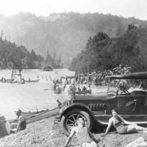 People Sunbathing on a Rio Nido Beach in Front of Their Old Model Car in 1920